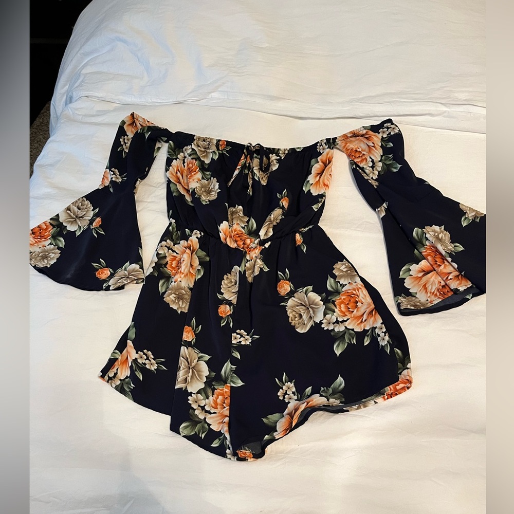 Adorable off-shoulder navy blue floral romper